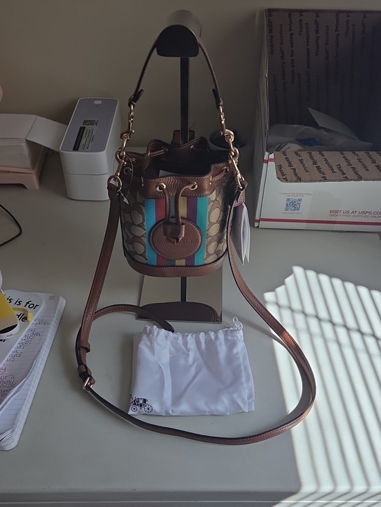 Coach Handbags - Coach Brown Demsey Signature Canvas Bucket Bag with Multicolor Stripe
